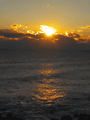 日の出の海